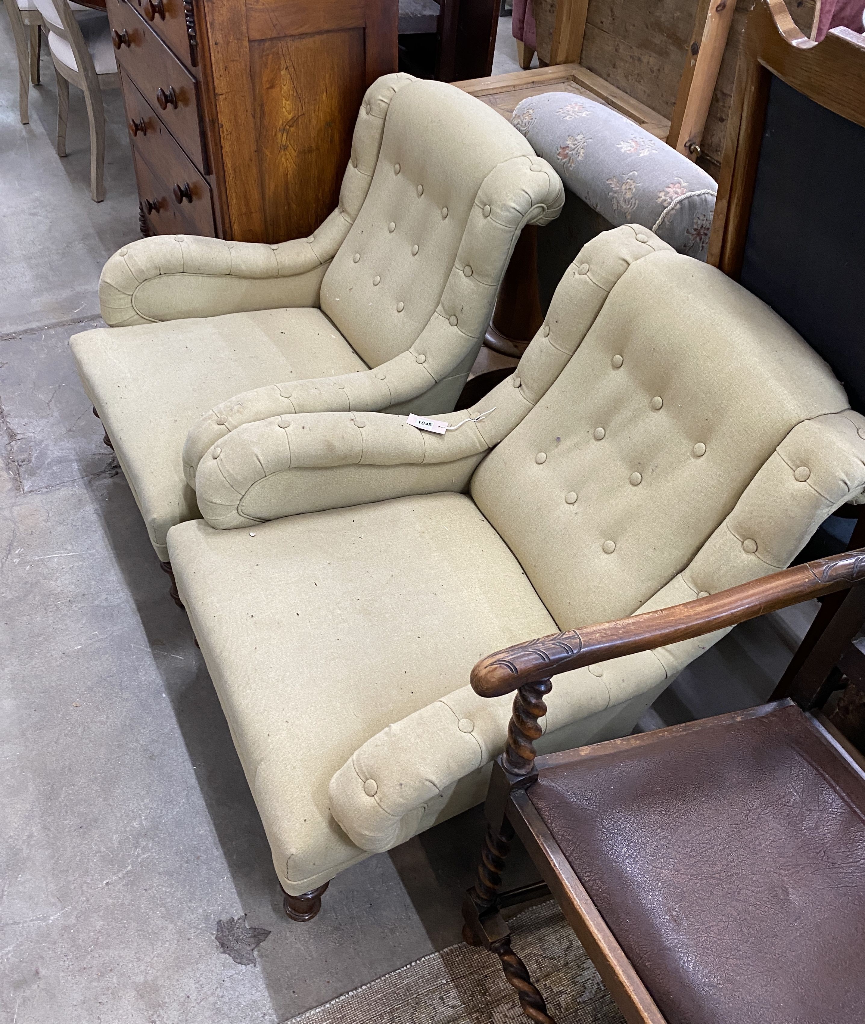 A pair of Victorian upholstered low elbow chairs, width 72cm, depth 80cm, height 80cm